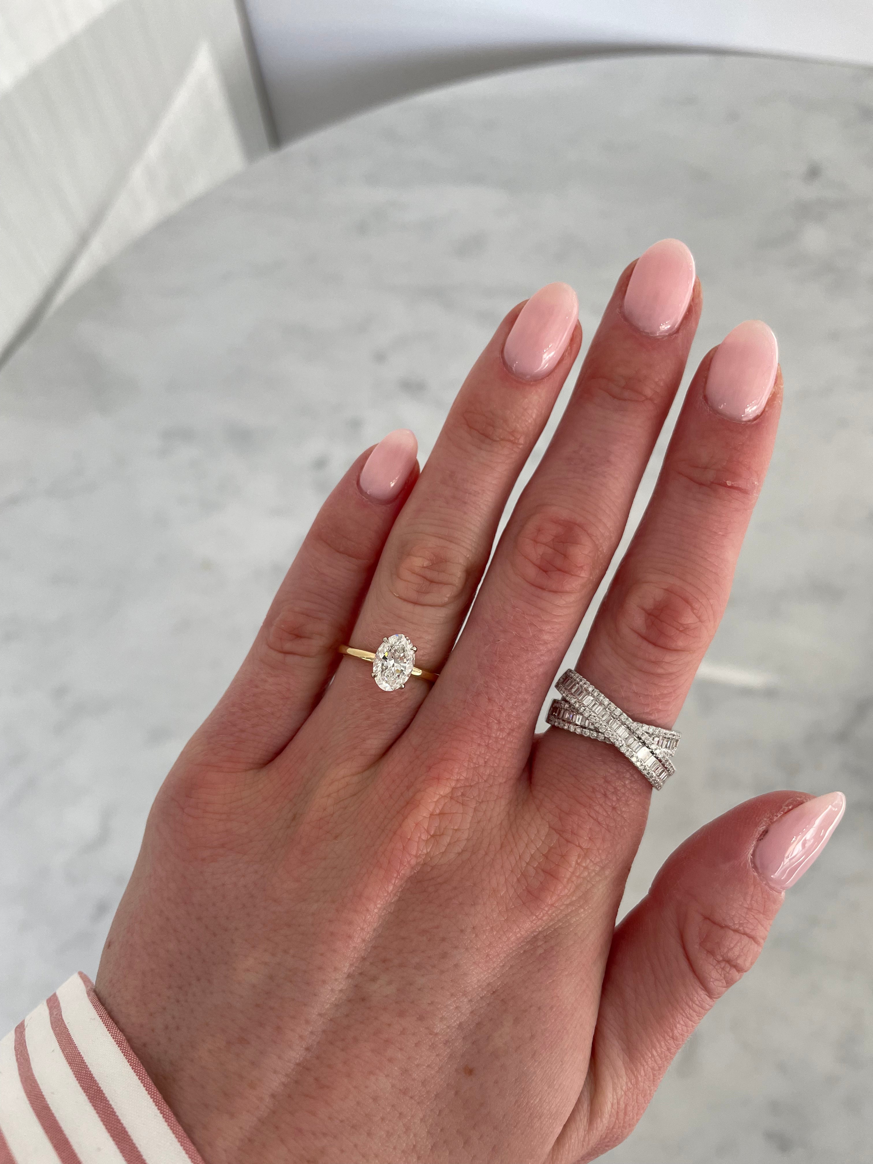 Oval Cut Engagement Ring with a Hidden Halo