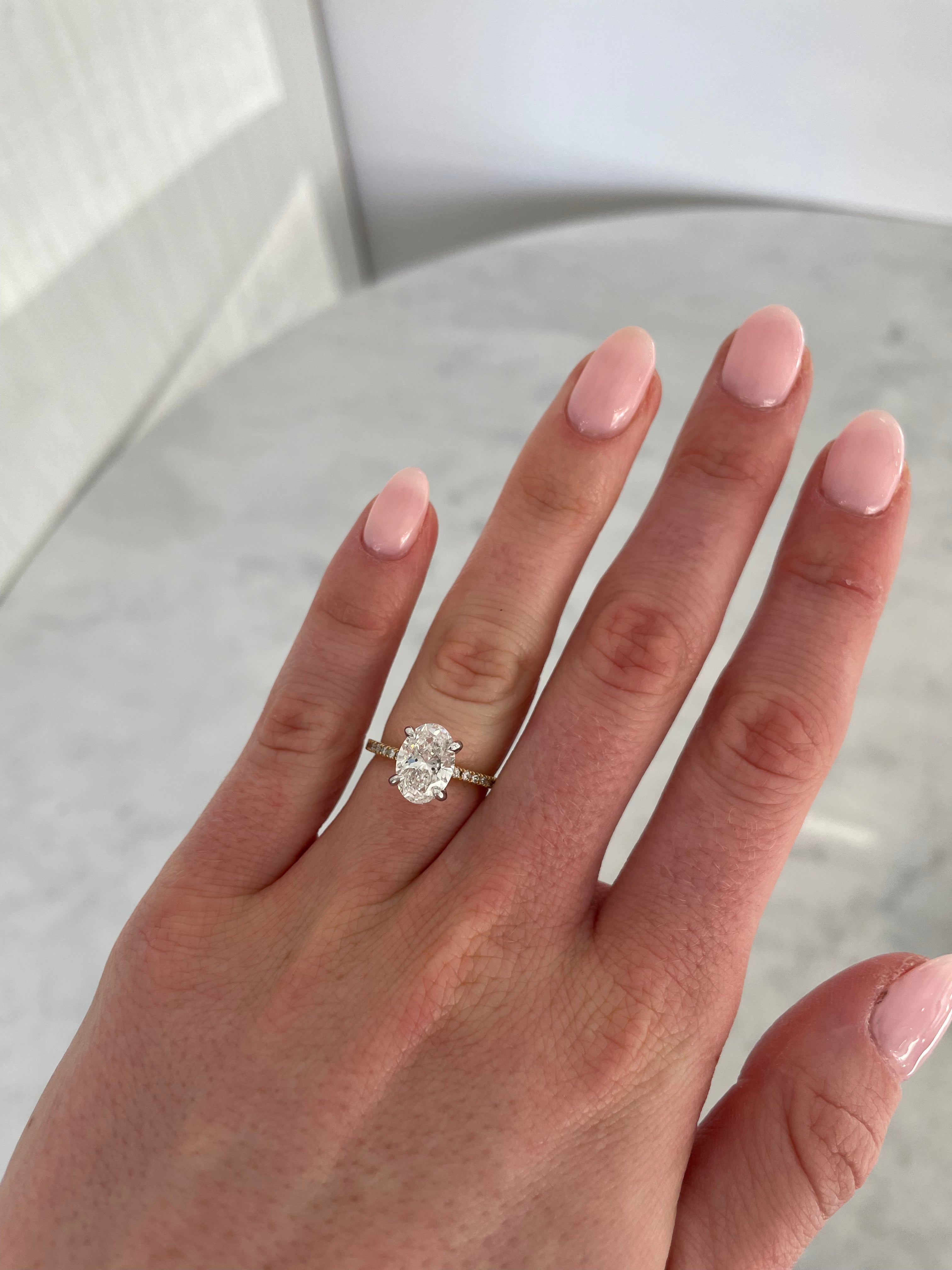 Oval Cut Engagement Ring with Pavé Band