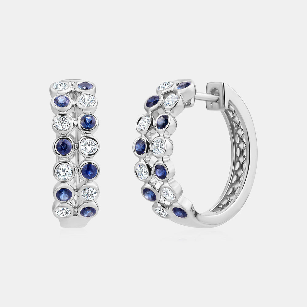 Boucles d'oreilles avec lunette en diamant et saphir