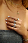 Bague pavée de perles à cinq rangs