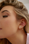 Clous d'oreilles cœur à bordure diamant