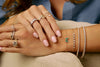 Omega Spiral Pear Diamond Ring