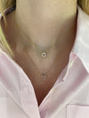 Mini collier coeur en opale rose bordé de diamants