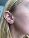 Clous d'oreilles cœur à bordure diamant