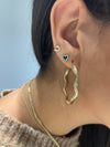 Clous d'oreilles cœur à bordure diamant