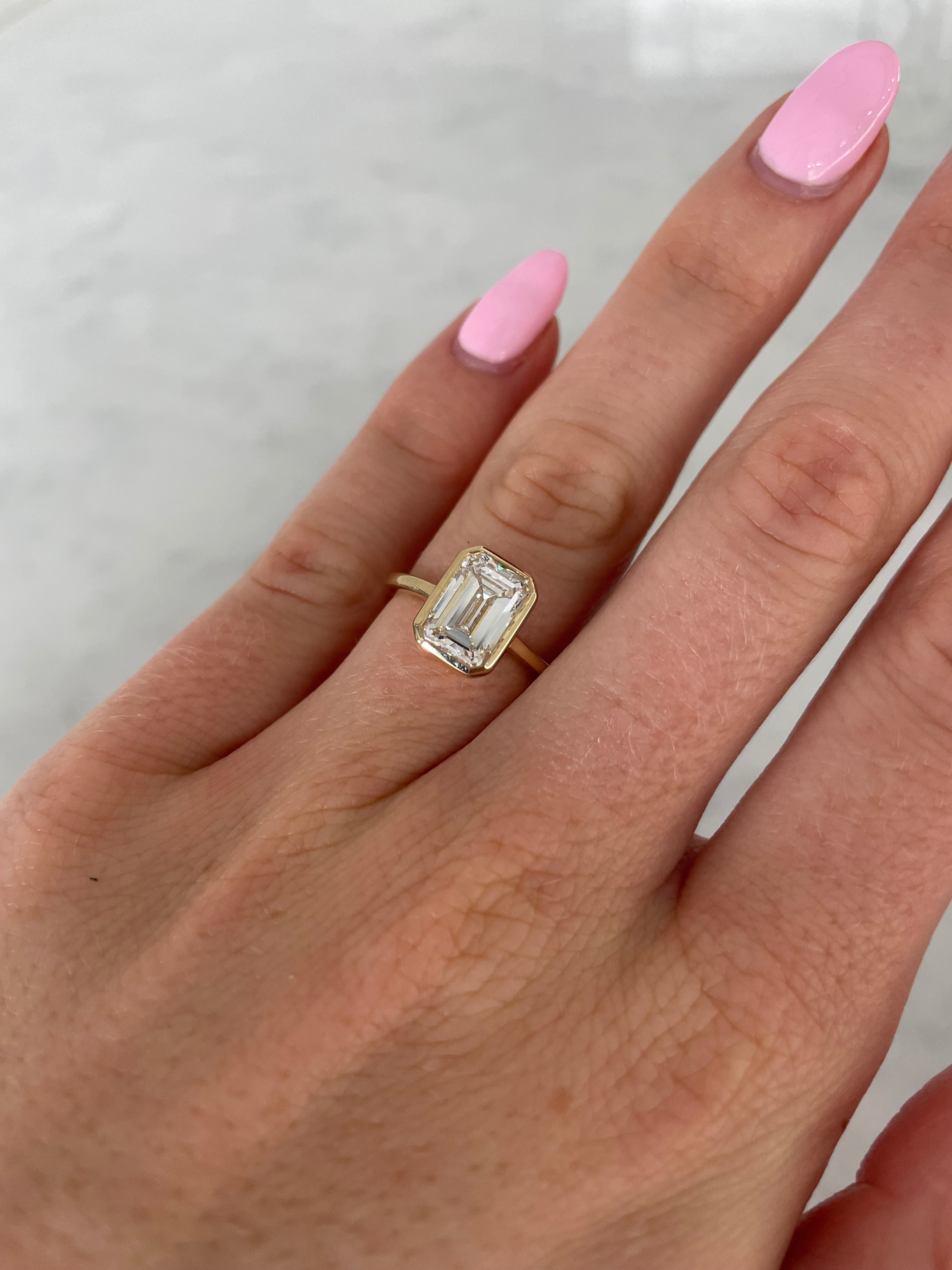 Bezel Set Lab Grown Emerald Cut Engagement Ring