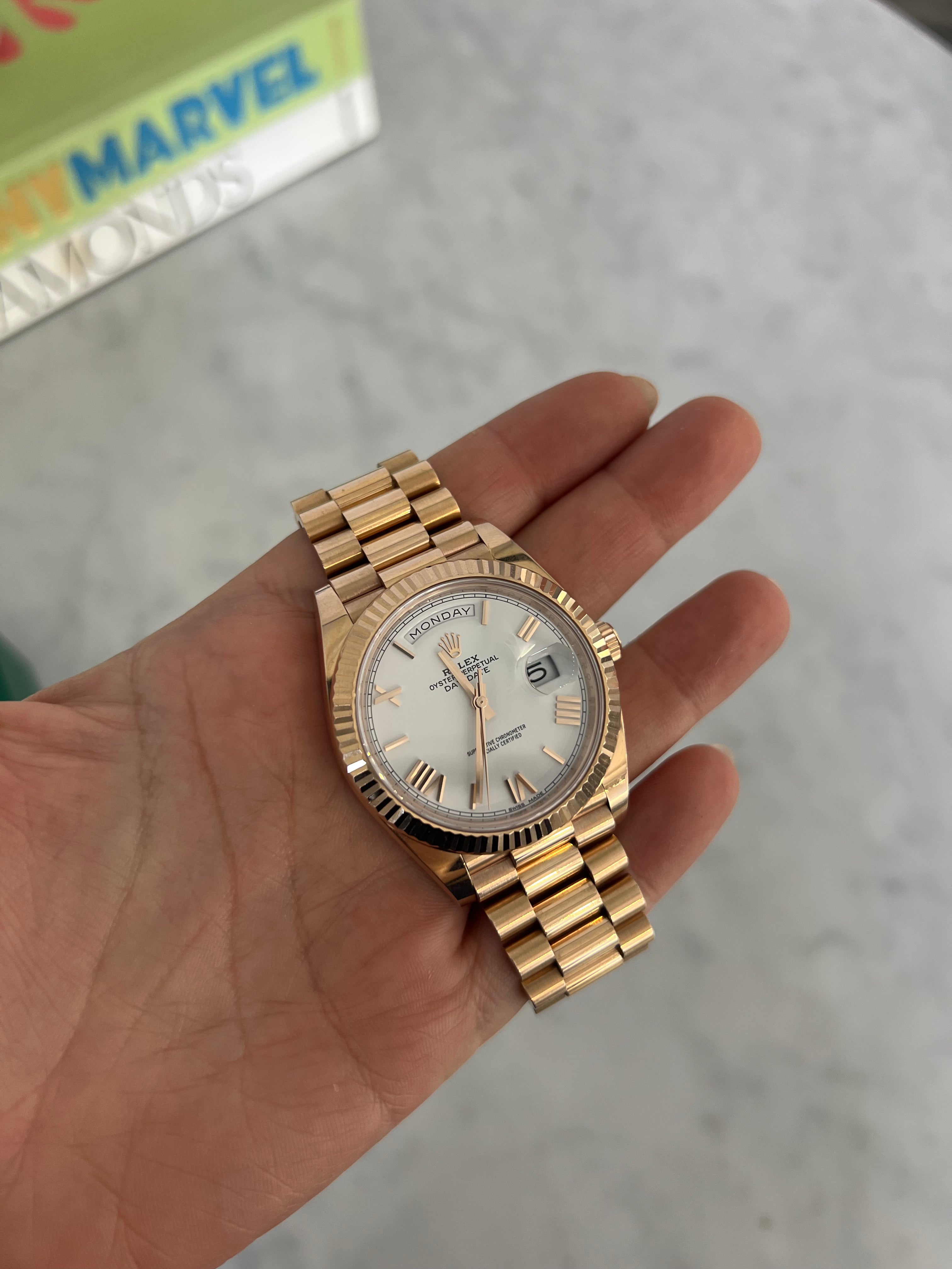 Rolex Day-Date Rose Gold White Dial with Roman Dial 228235