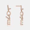 Boucles d'Oreilles "LOVE" pendant en Diamant
