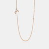 Collier avec initiales en cursive et lunette en diamant