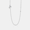 Collier avec initiales en cursive et lunette en diamant