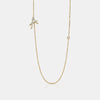 Collier avec initiales en cursive et lunette en diamant
