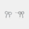 Clous d'oreilles en diamant en Nœud Ruban