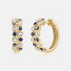 Boucles d'oreilles avec lunette en diamant et saphir