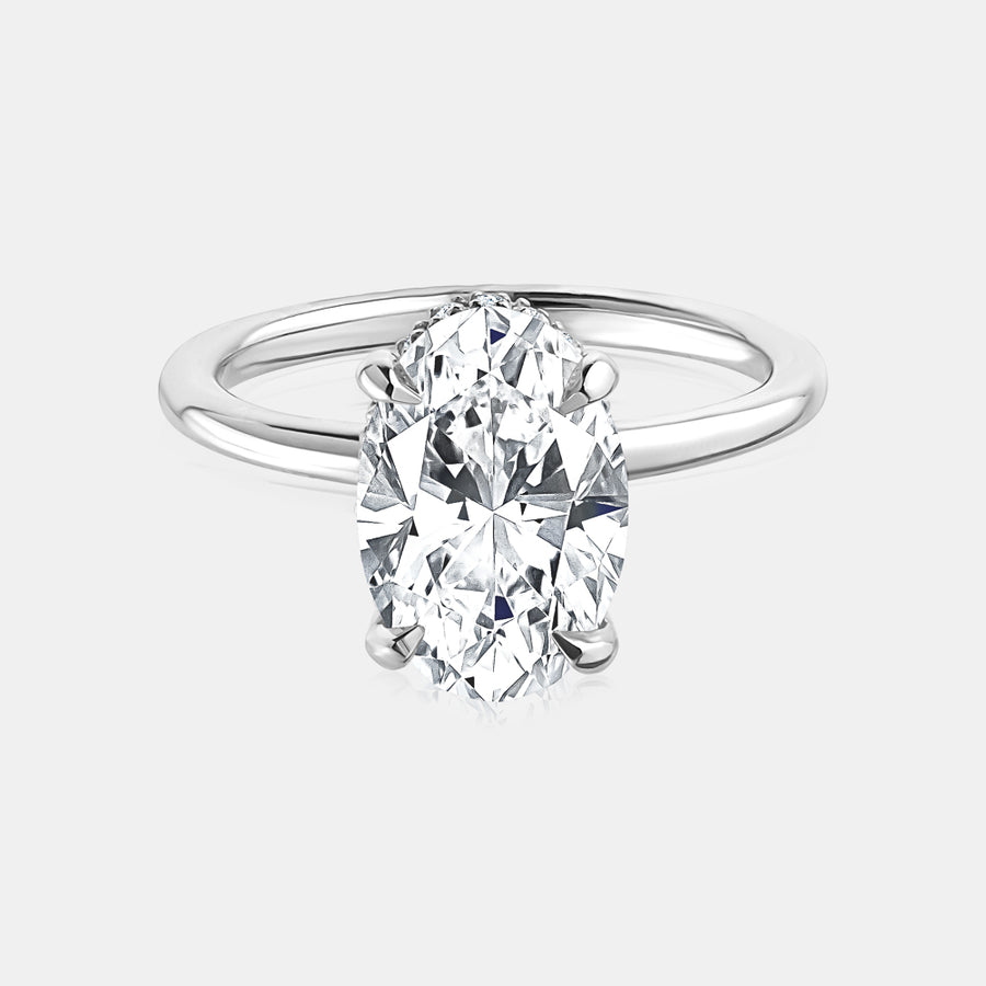 BAGUE DE FIANÇAILLES OVALE AVEC HALO CACHÉ
