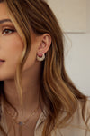 Boucles d'oreilles avec lunette en diamant