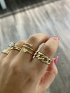 Bague spirale avec cœur et chaton en diamant