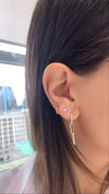 Boucles d'oreilles en forme de trombone en diamant