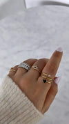 Bague spirale avec cœur et chaton en diamant