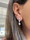 Boucles d'oreilles pendantes avec illusion d'émeraude