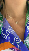 Collier avec initiales en cursive de diamants
